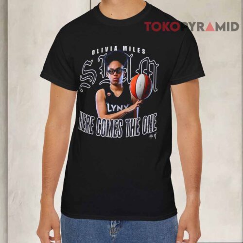 2026 Olivia Mile SLAM Here Comes The One T Shirt 2026 Olivia Mile SLAM Here Comes The One T Shirt