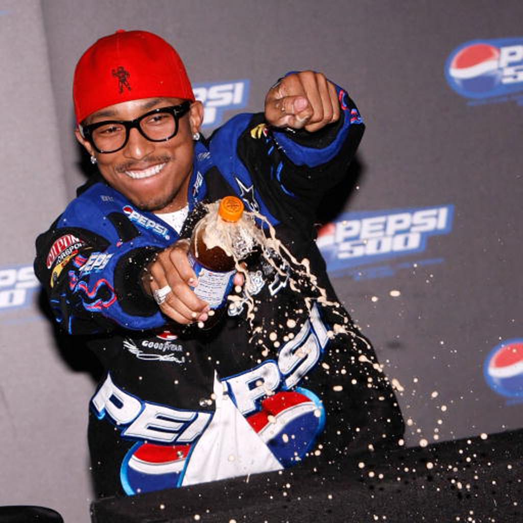 Rapper Pharrell Williams attends RADAR Entertainment's Pepsi 500 Rapper Pharrell Williams attends RADAR Entertainment's Pepsi 500