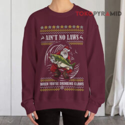 Santa Claus Holding Big Fish Sweatshirt Ain't No Laws When You're Drinking Claus Christmas Red Sweatshirt