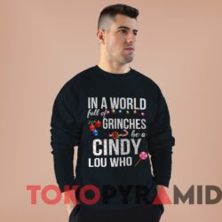 Vintage In A World Full Of Grinches Be A Cindy Lou Who Sweater Black